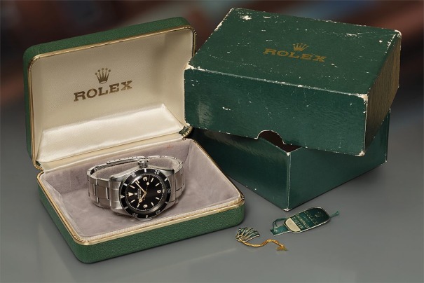 An extremely rare, important, and early stainless steel wristwatch with black glossy Explorer dial, gilt hands, presentation box, and hangtags.